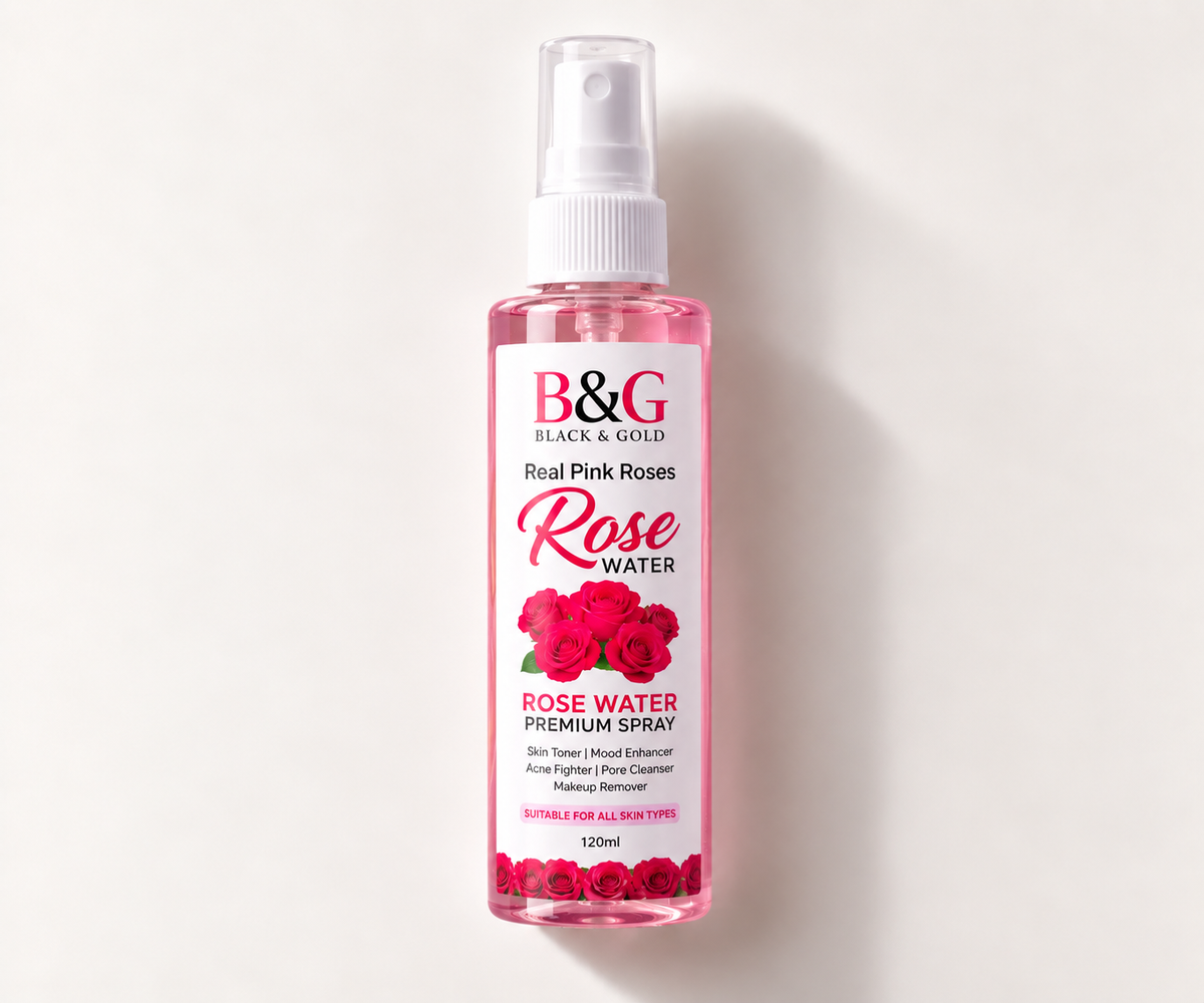 B&G Black & Gold Real Pink Roses Rose Water Premium Spray in a clear plastic bottle with a white spray nozzle, filled with pink liquid, set against a plain off-white background.